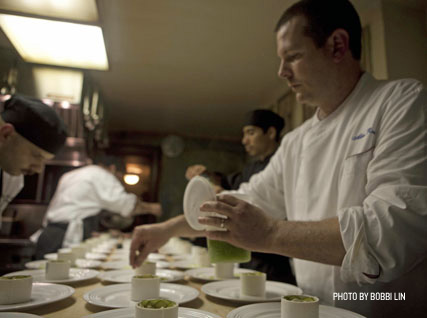 Plating a dish in the Beard House kitchen.