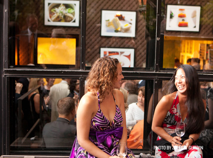 Guests enjoy the back patio at the Beard House.