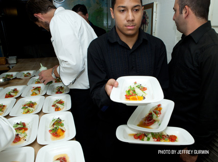 Serving a fresh tomato salad at a Beard House dinner.