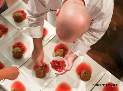 A Beard House chef plates dishes at a recent dinner.