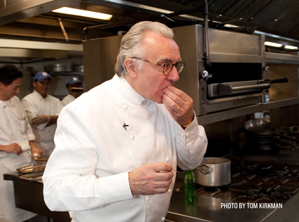 Alain Ducasse sneaks a bite in the Four Seasons kitchen