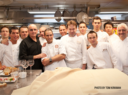 Chefs and volunteers from the French Culinary Institute pose for a photo