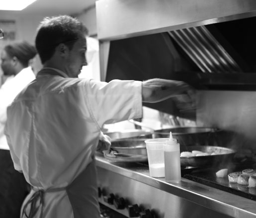 a chef at work in the James Beard House kitchen