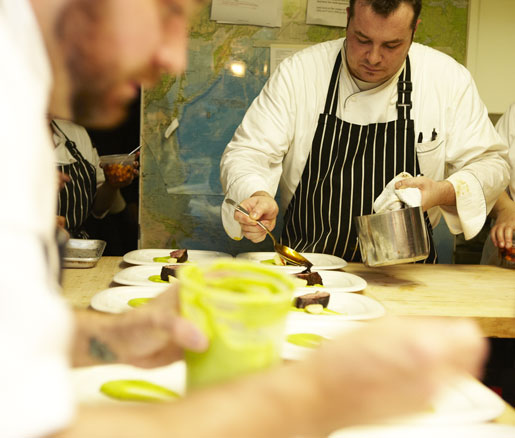 chefs plating in the James Beard House kitchen