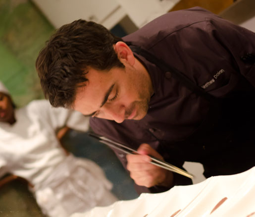 a chef at work in the James Beard House kitchen