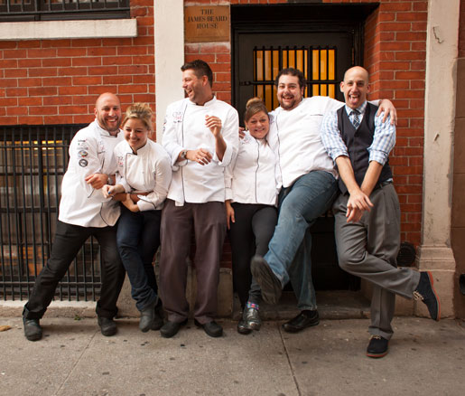 Chefs pose for a photo in front of the James Beard House