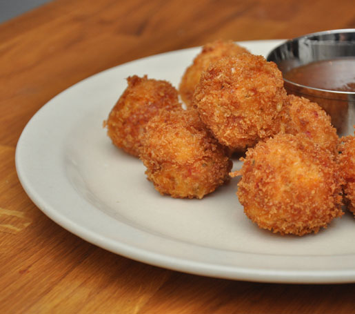 Daniel Doyle's recipe for Pimento Cheese Fritters with Green Tomato Jam, adpated by the James Beard Foundation