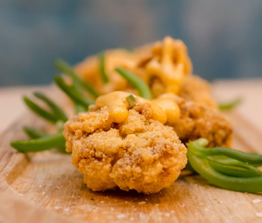 Recipe for Cornmeal-Crusted Oysters with Sriracha Rémoulade, adpated by the James Beard Foundation