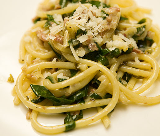 Recipe for Bucatini with Ramps and Pancetta, adapted by the James Beard Foundation