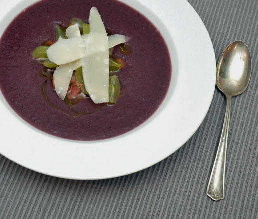 Recipe for Red Cabbage Soup with Crispy Guanciale, Parmigiano-Reggiano, and Grapes, adpated by the James Beard Foundation